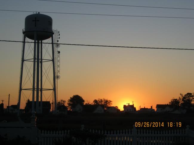 Water tower at sunrise